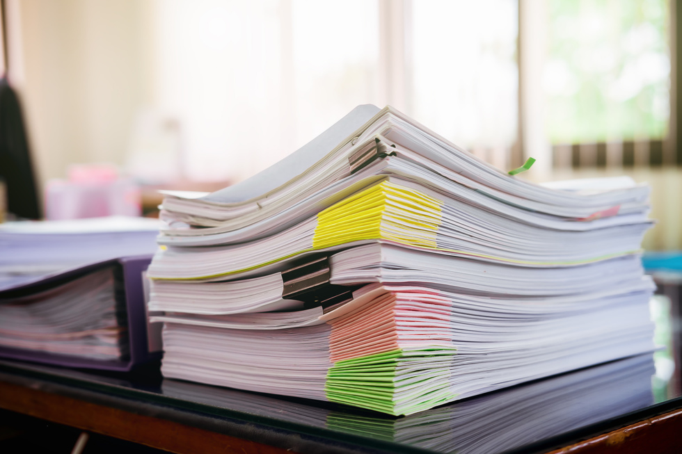 Stack of Organized Documents on Office Table